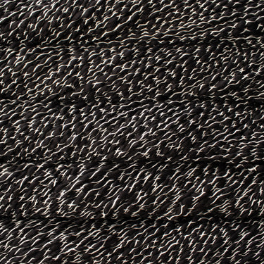 Malabrigo Caracol Yarn - 063 Natural on Black