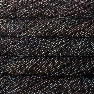 Malabrigo Caracol Yarn - 875 Arapey on Black